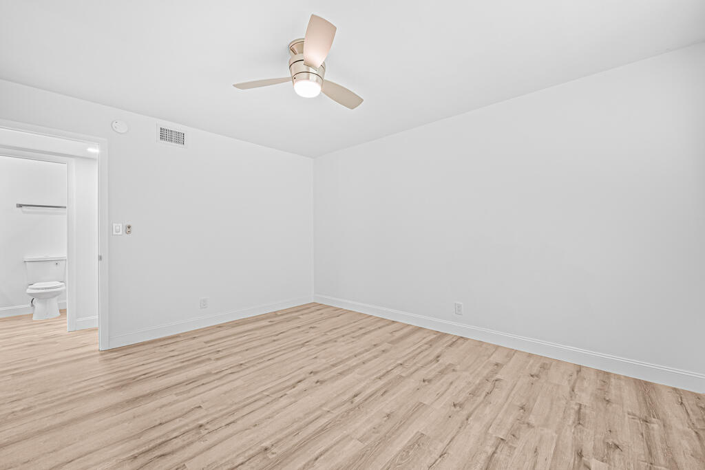 405 High Point Boulevard North, Unit D Delray Beach, FL 33445 - Photo 22 of 51 Master Bedroom