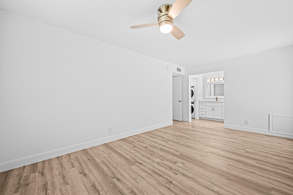 405 High Point Boulevard North, Unit D Delray Beach, FL 33445 - Photo 24 of 51 Master Bedroom