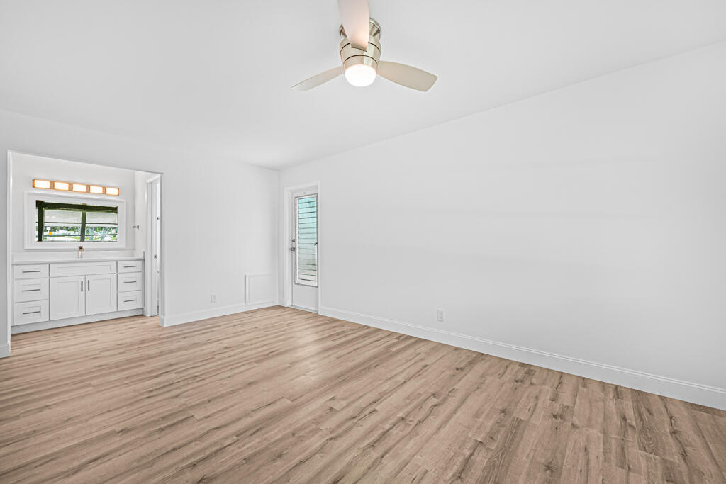 405 High Point Boulevard North, Unit D Delray Beach, FL 33445 - Photo 25 of 51 Master Bedroom