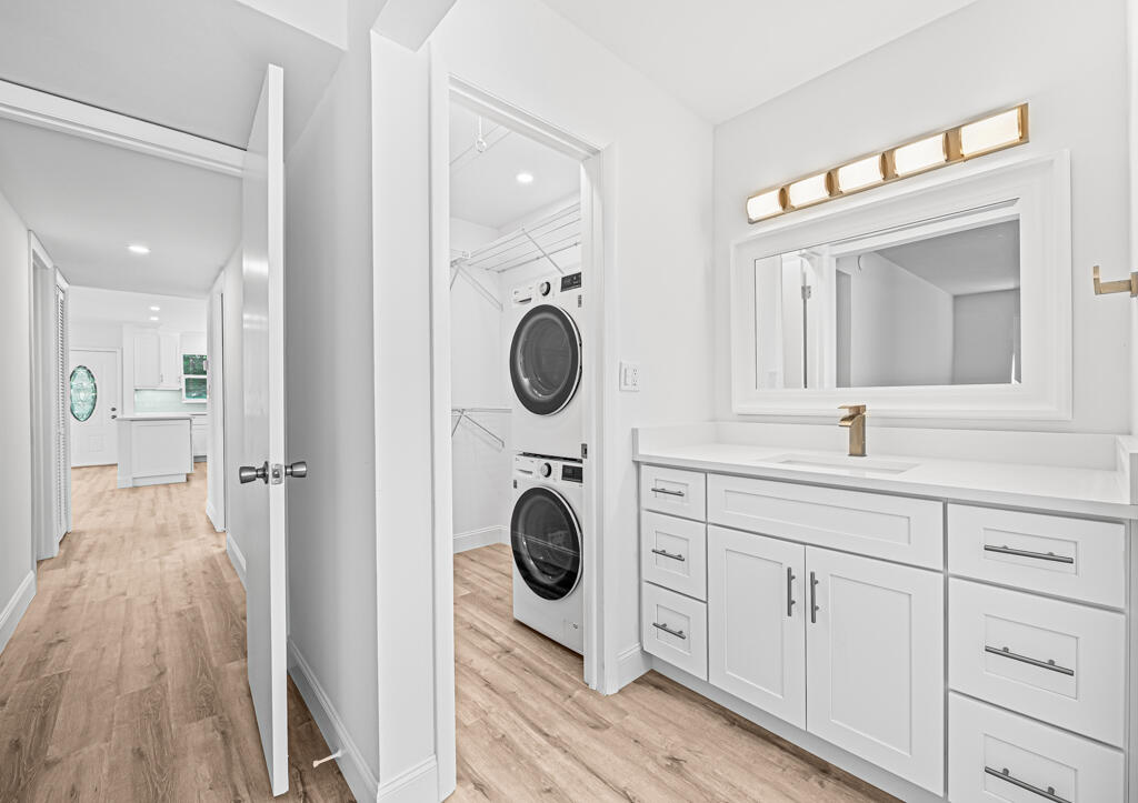 405 High Point Boulevard North, Unit D Delray Beach, FL 33445 - Photo 26 of 51 Master Vanity/Walk-in/Washer & Dryer