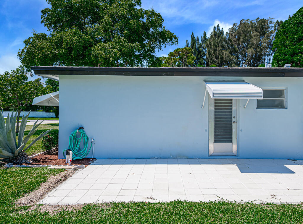 405 High Point Boulevard North, Unit D Delray Beach, FL 33445 - Photo 30 of 51 Exterior Rear