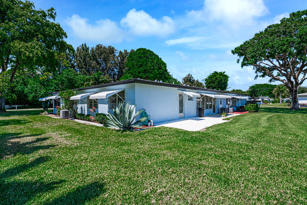 405 High Point Boulevard North, Unit D Delray Beach, FL 33445 - Photo 31 of 51 Exterior Rear