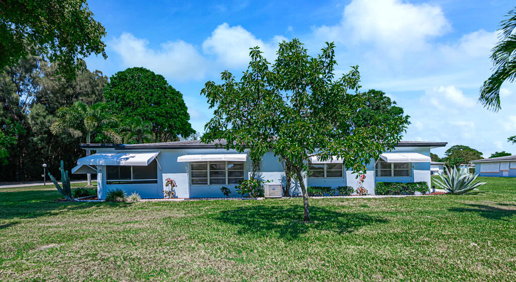 405 High Point Boulevard North, Unit D Delray Beach, FL 33445 - Photo 32 of 51 Exterior Rear