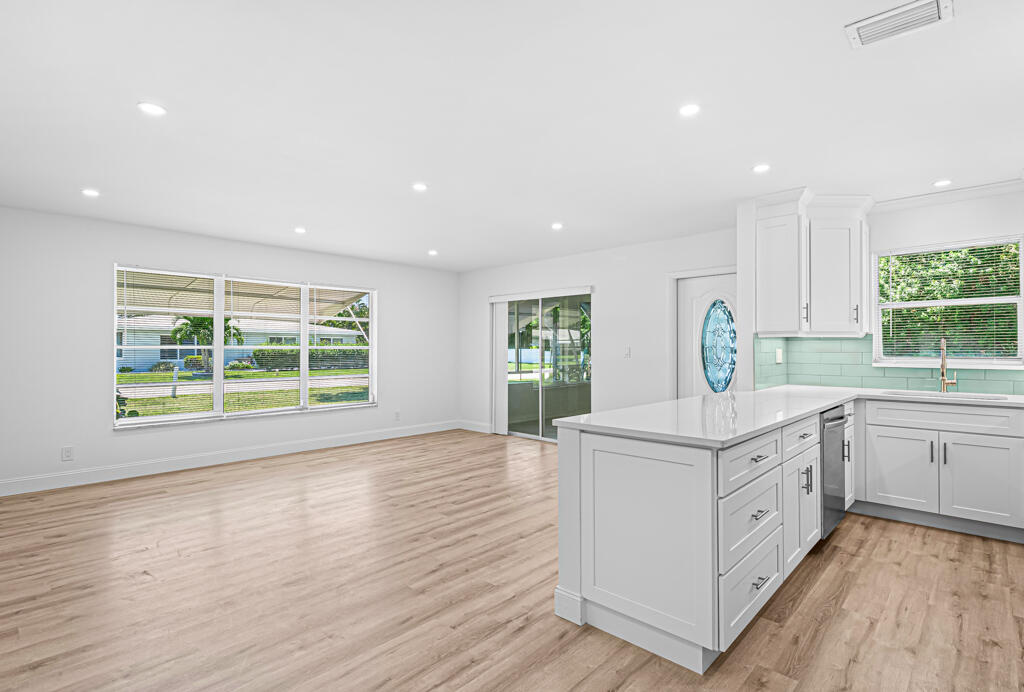 405 High Point Boulevard North, Unit D Delray Beach, FL 33445 - Photo 8 of 51 Living Room/Kitchen