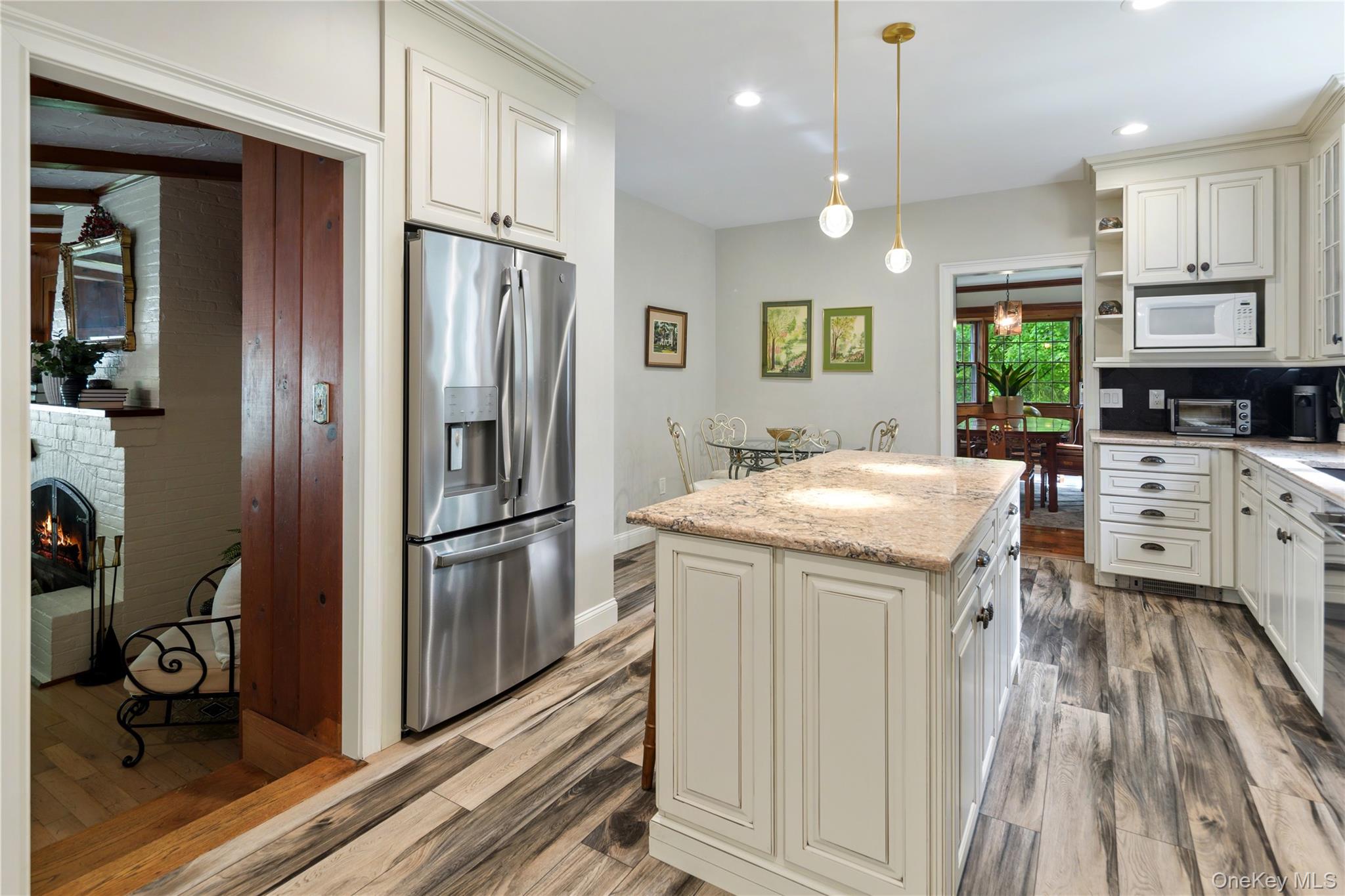 36 Granite Springs Road Granite Springs, NY 10527 - Photo 23 of 49 a kitchen with kitchen island a counter top space a sink stainless steel appliances and cabinets