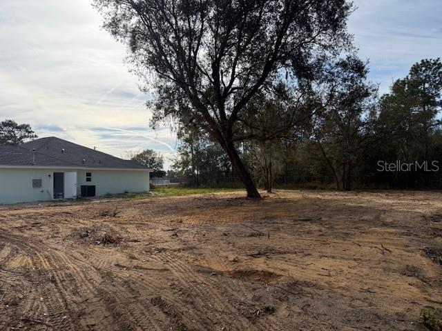 Tbd Hemlock Radial Trail Ocala, FL 34472 - Photo 3 of 5 a view of a house with a yard