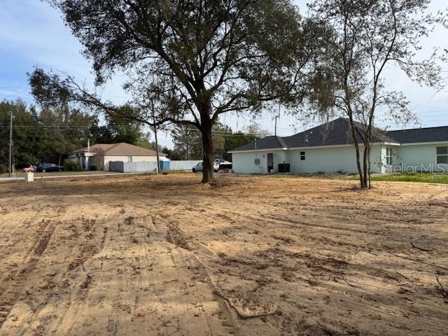 Tbd Hemlock Radial Trail Ocala, FL 34472 - Photo 4 of 5 a view of a house with a yard