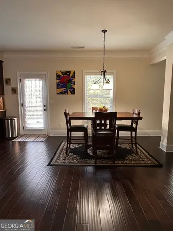 a view of livingroom with furniture and windows