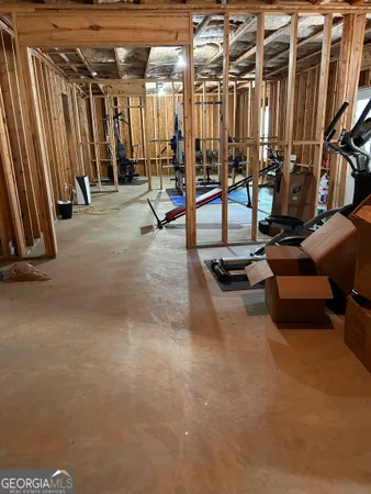 a view of hallway with wooden floor