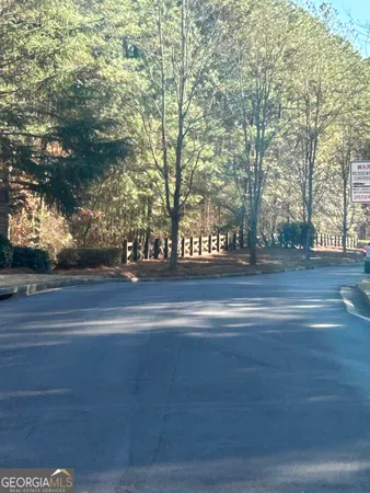 a view of a livingroom with furniture and a ceiling fan