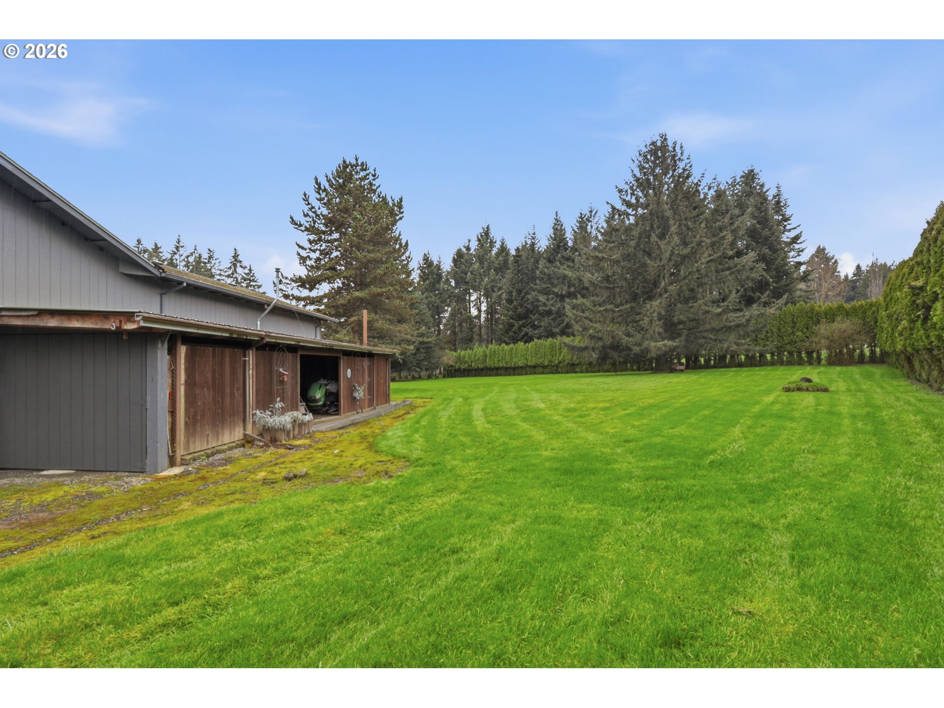 33954 Vista Lane Warren, OR 97053 - Photo 14 of 48 a backyard of a house with large trees