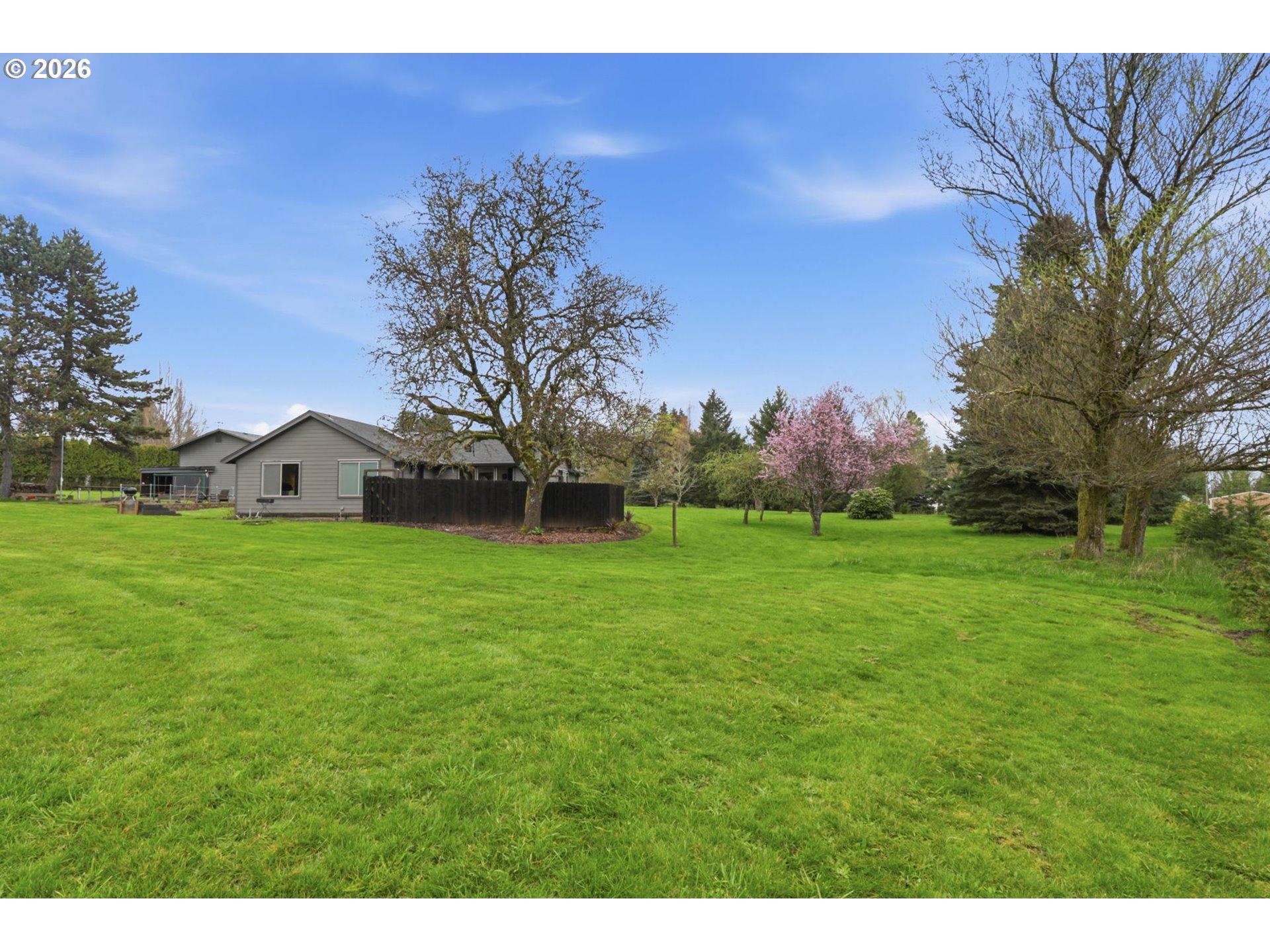33954 Vista Lane Warren, OR 97053 - Photo 16 of 48 a view of a house with a yard