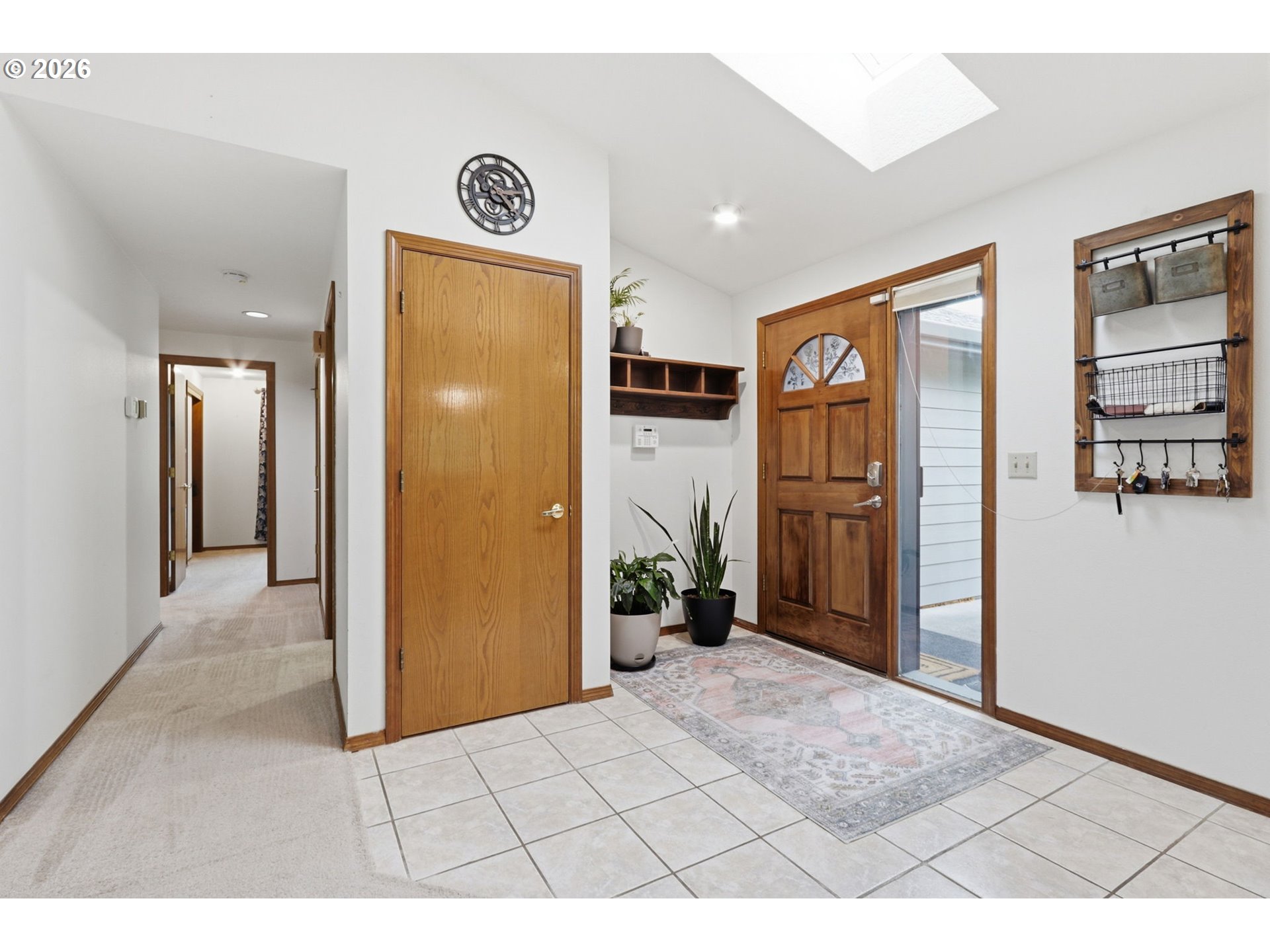 33954 Vista Lane Warren, OR 97053 - Photo 20 of 48 a view of a hallway with a refrigerator and a stove