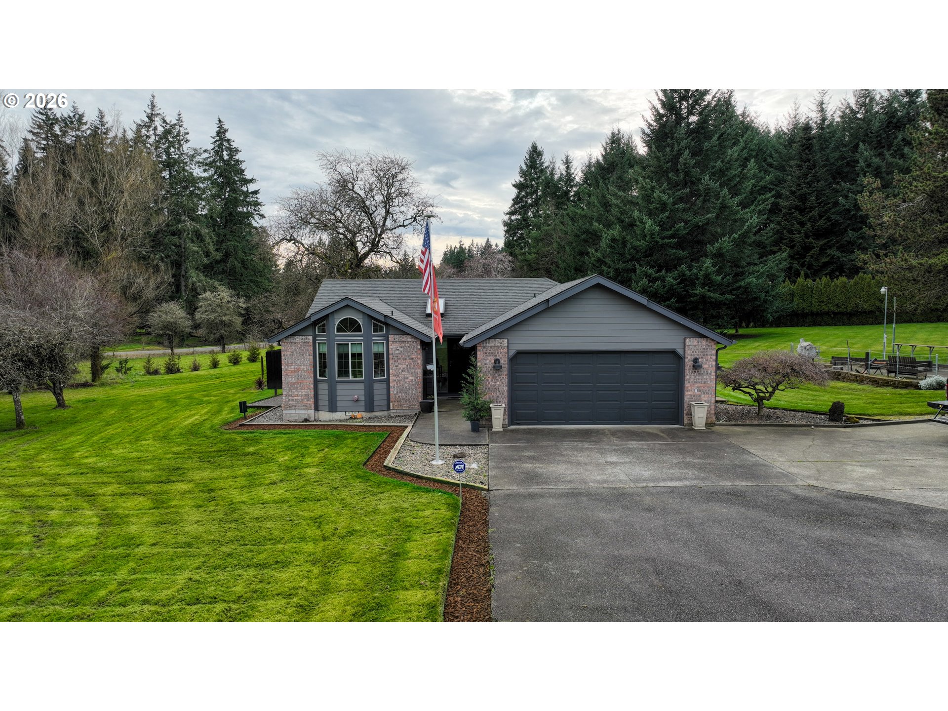 33954 Vista Lane Warren, OR 97053 - Photo 2 of 48 a house view with a garden space