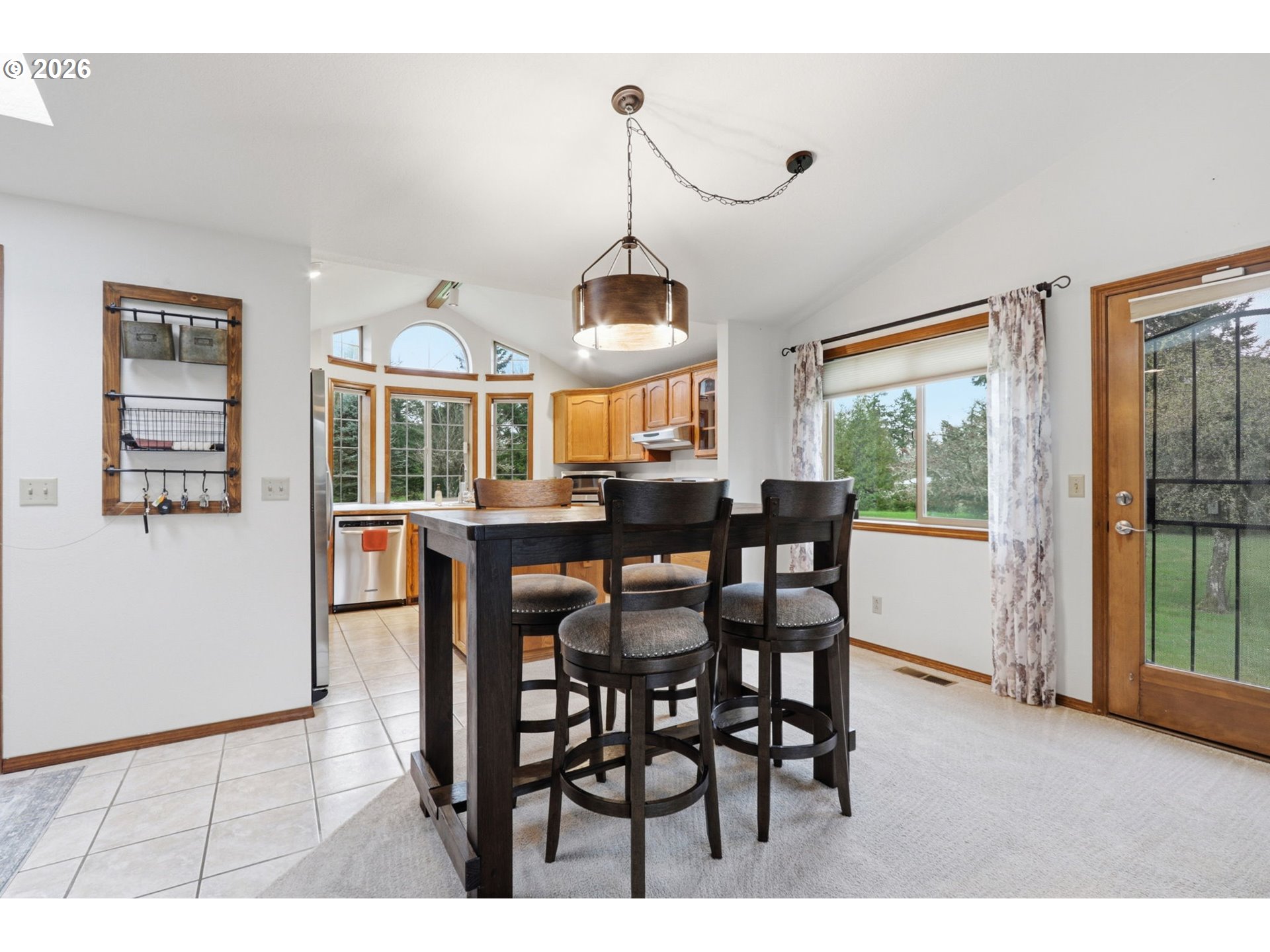 33954 Vista Lane Warren, OR 97053 - Photo 26 of 48 a dining room with furniture and window