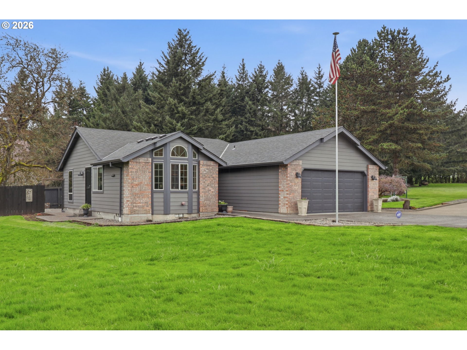 33954 Vista Lane Warren, OR 97053 - Photo 4 of 48 a front view of a house with a yard
