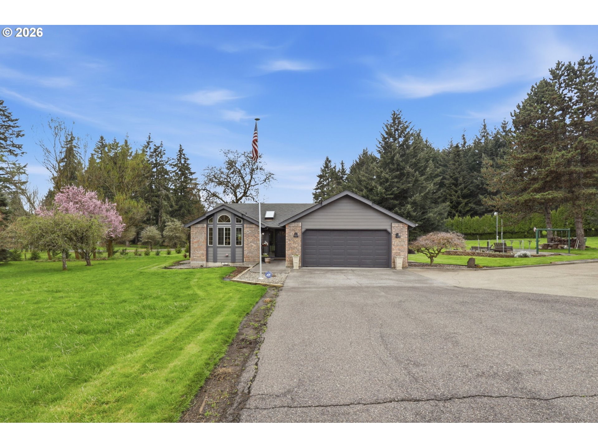 33954 Vista Lane Warren, OR 97053 - Photo 5 of 48 a view of a house with a big yard plants and large trees
