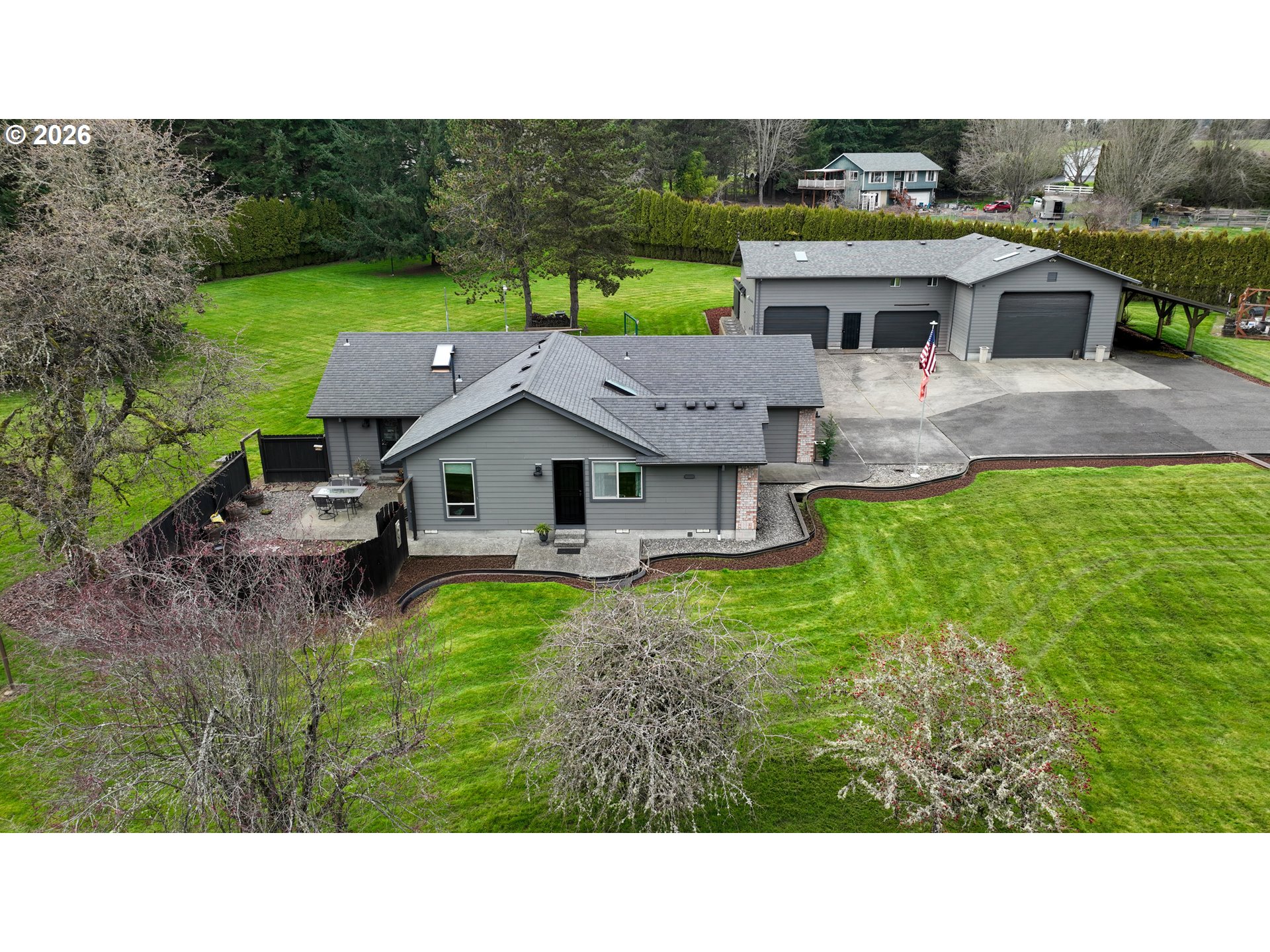 33954 Vista Lane Warren, OR 97053 - Photo 6 of 48 a aerial view of a house with a garden