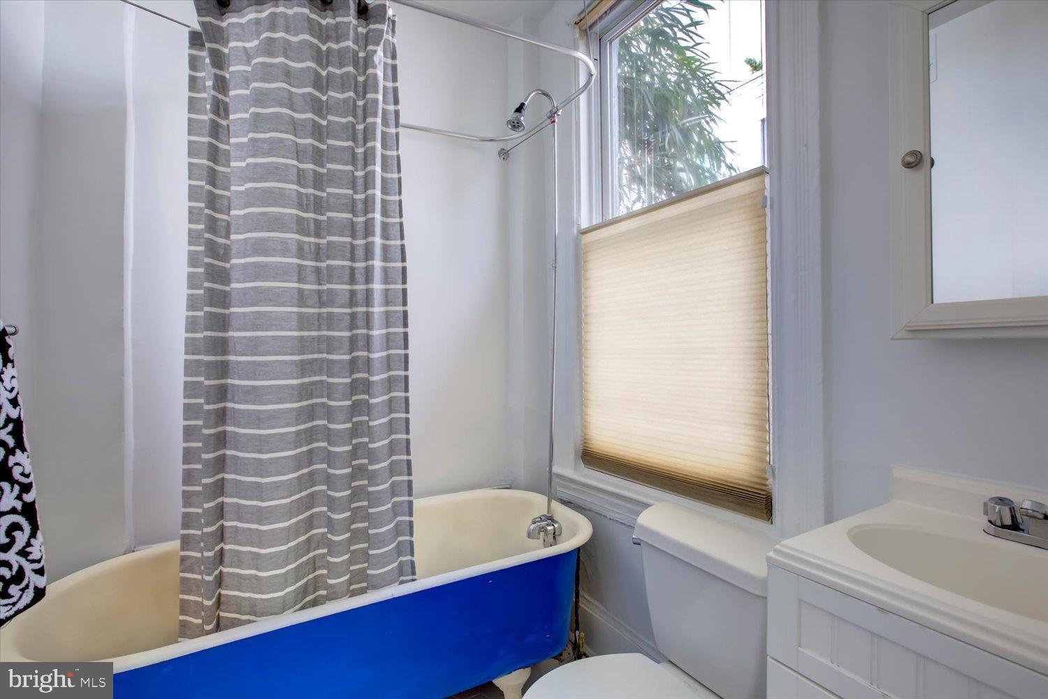 911 Independence Avenue Southeast Washington, DC 20003 - Photo 11 of 38 First floor bathroom with vintage tub.
