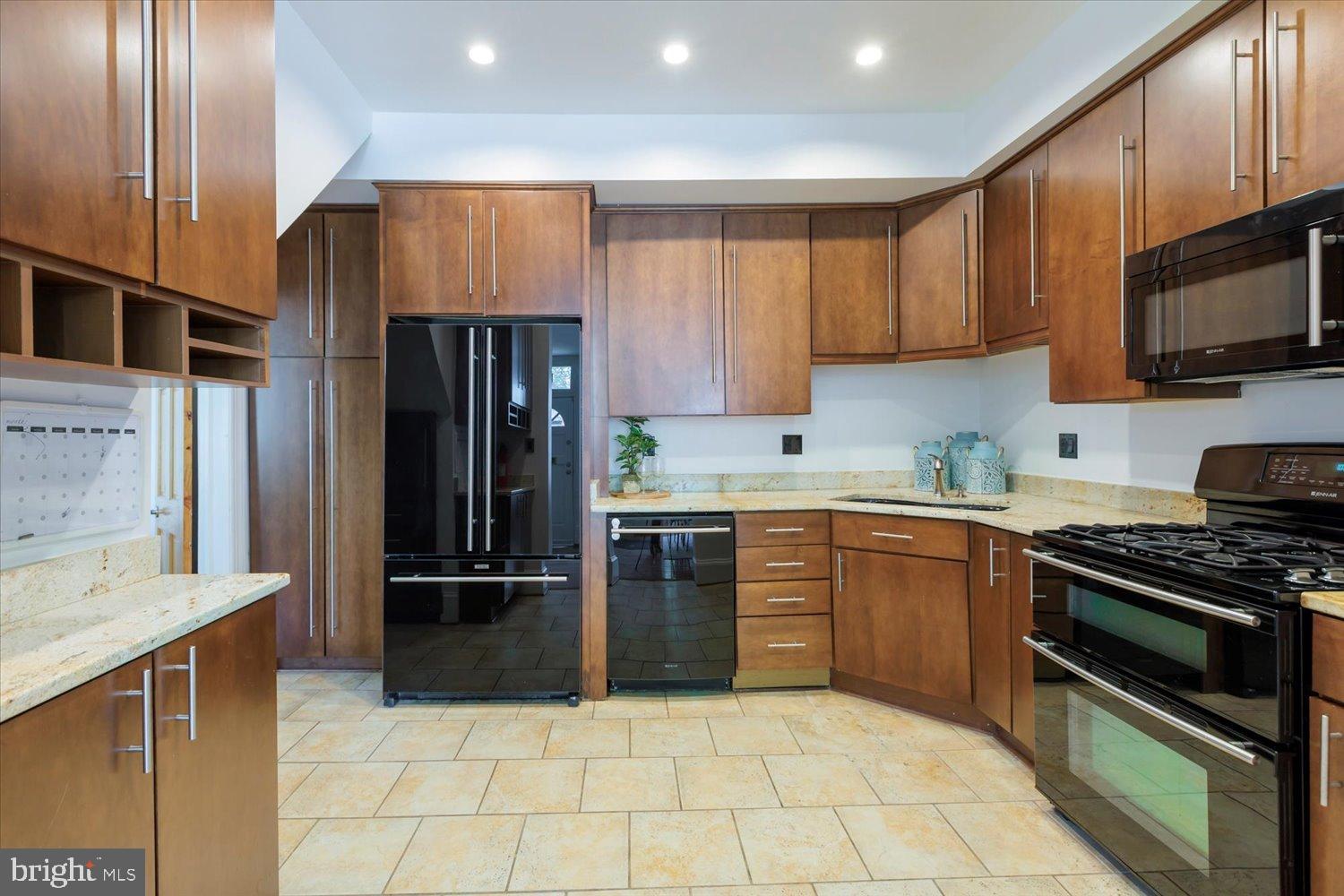 911 Independence Avenue Southeast Washington, DC 20003 - Photo 15 of 38 Modern kitchen with sleek cabinetry.