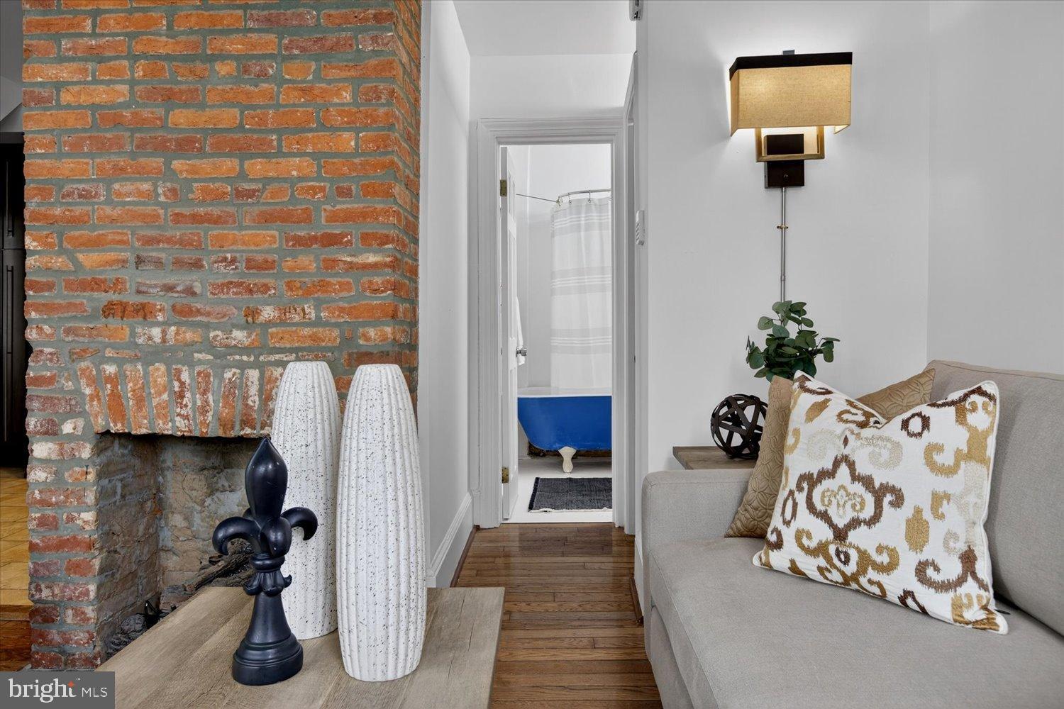 911 Independence Avenue Southeast Washington, DC 20003 - Photo 10 of 38 Charming space with rustic brick accents.