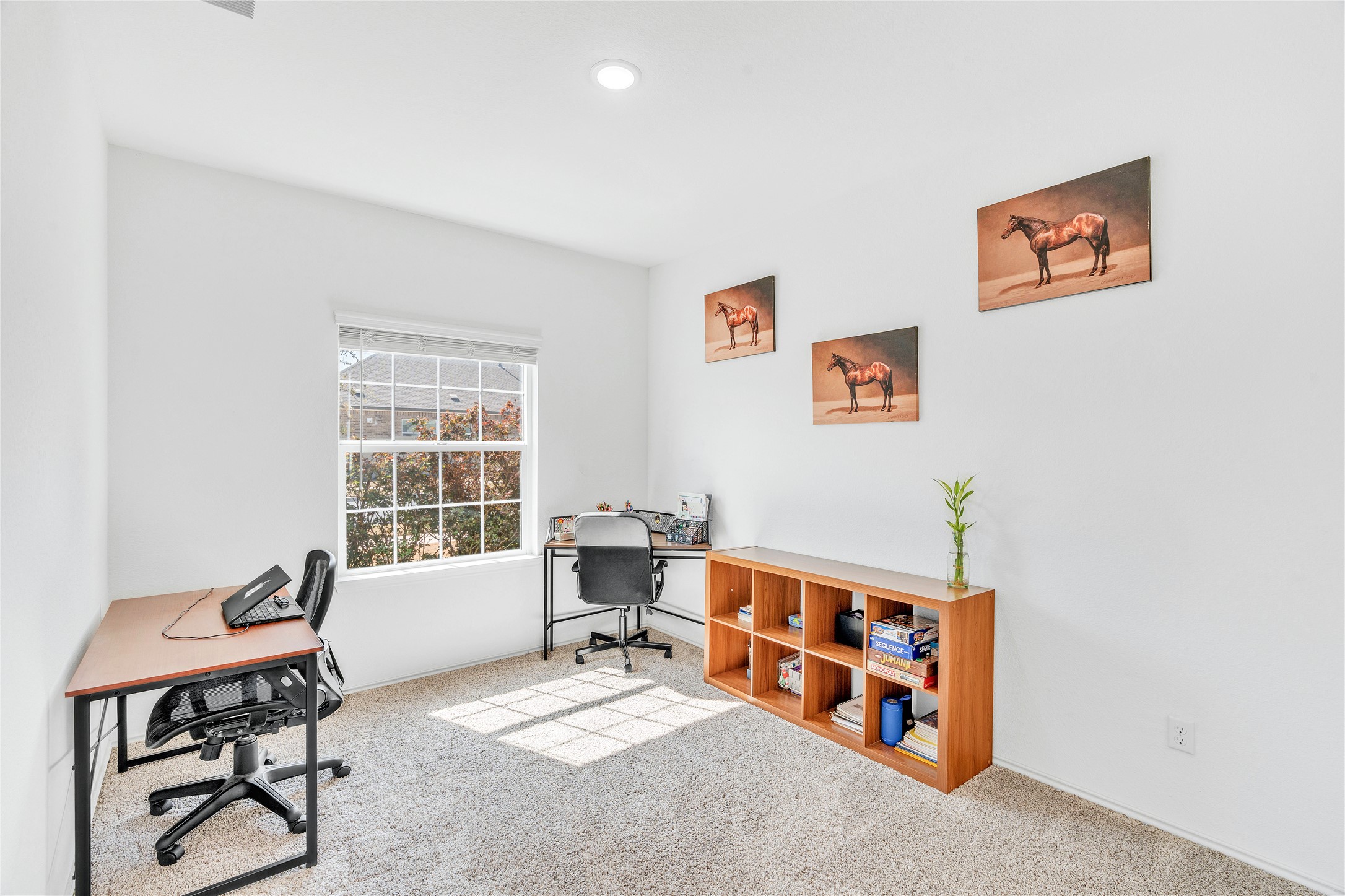 212 Saddle Mountain Road Georgetown, TX 78628 - Photo 3 of 30 A quiet study space with ample natural light, ideal for focused work.