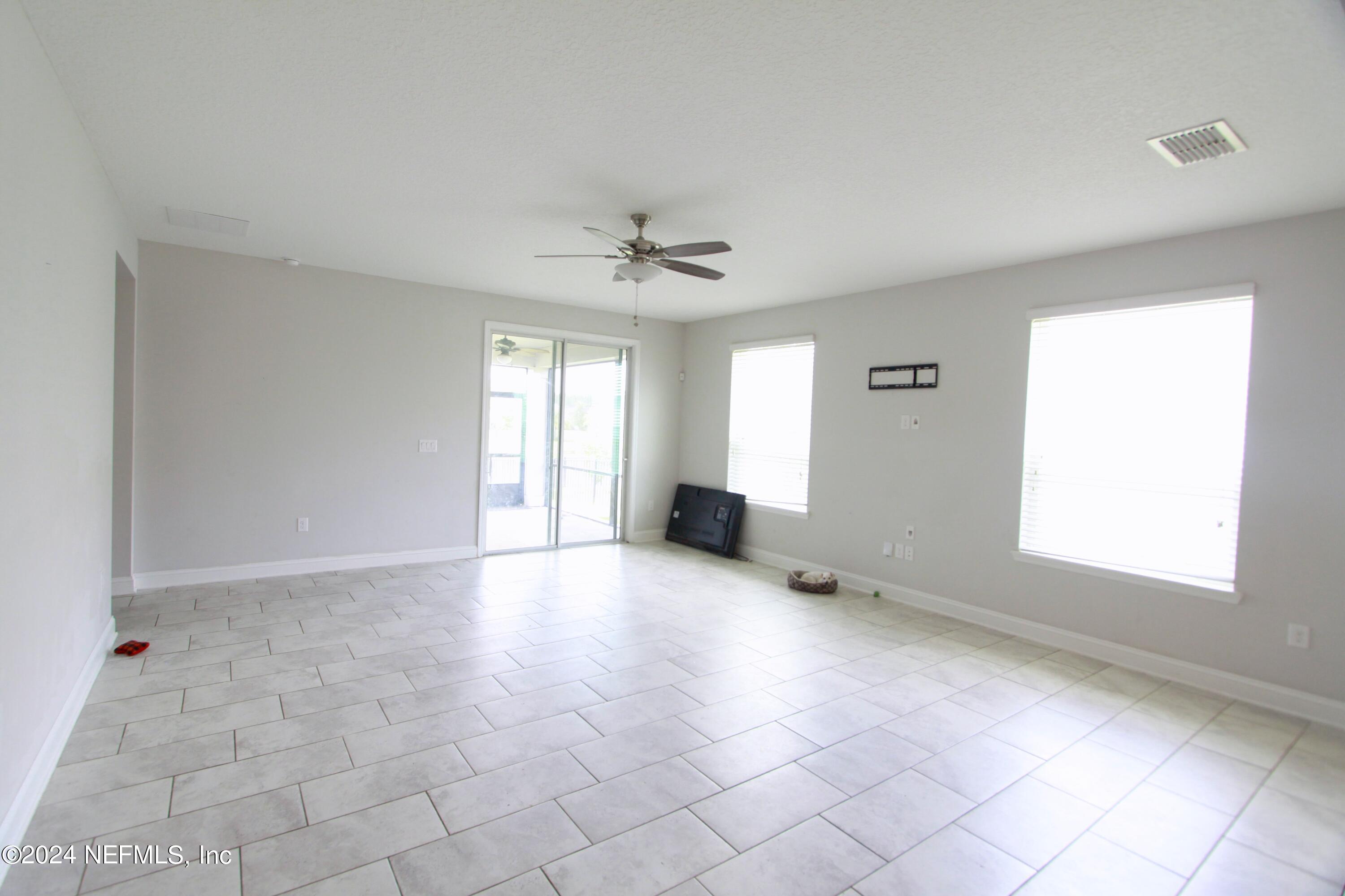 458 Convex Lane St. Augustine, FL 32095 - Photo 12 of 26 a view of an empty room with a window
