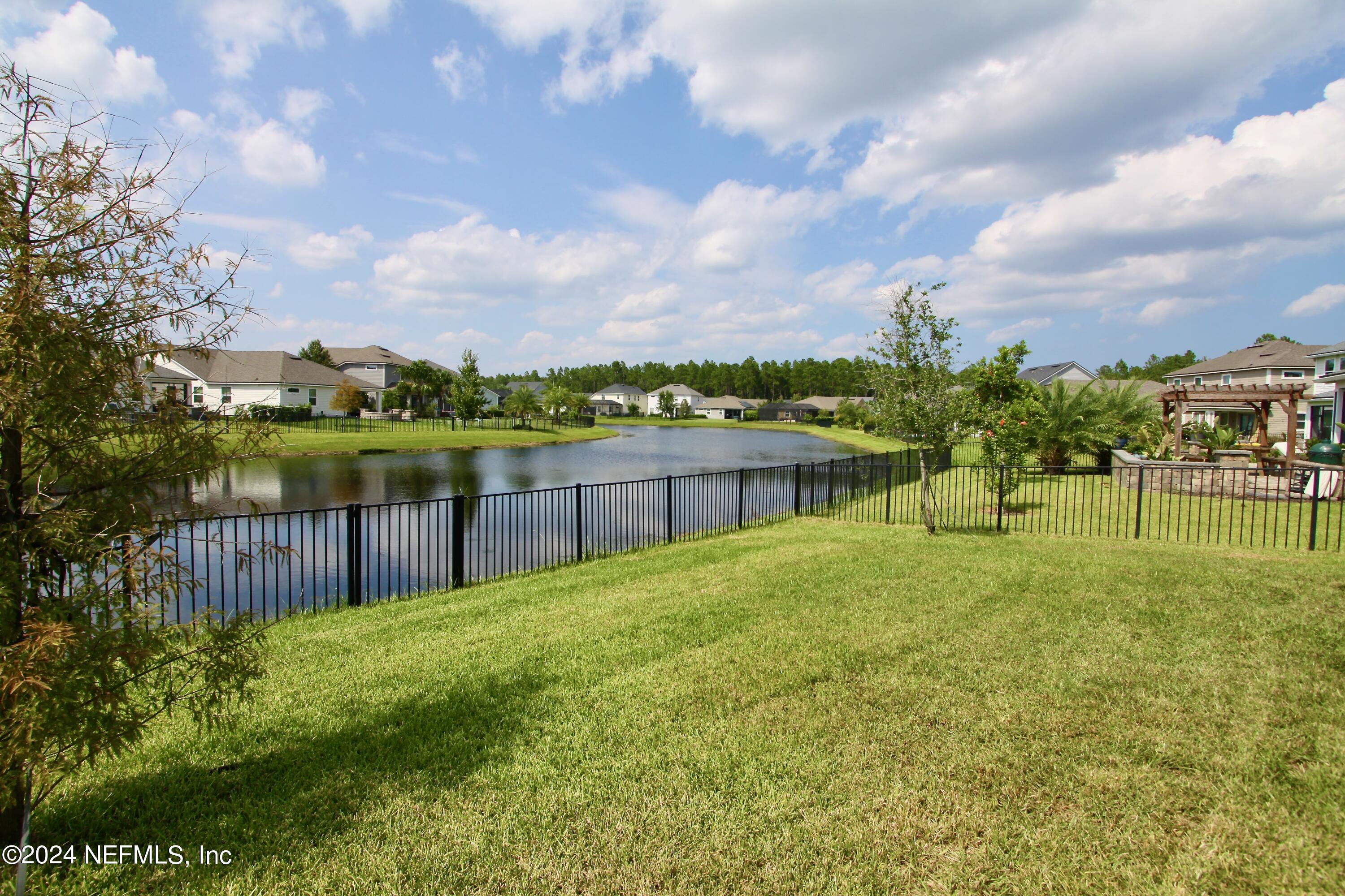 458 Convex Lane St. Augustine, FL 32095 - Photo 2 of 26 a view of a garden with houses