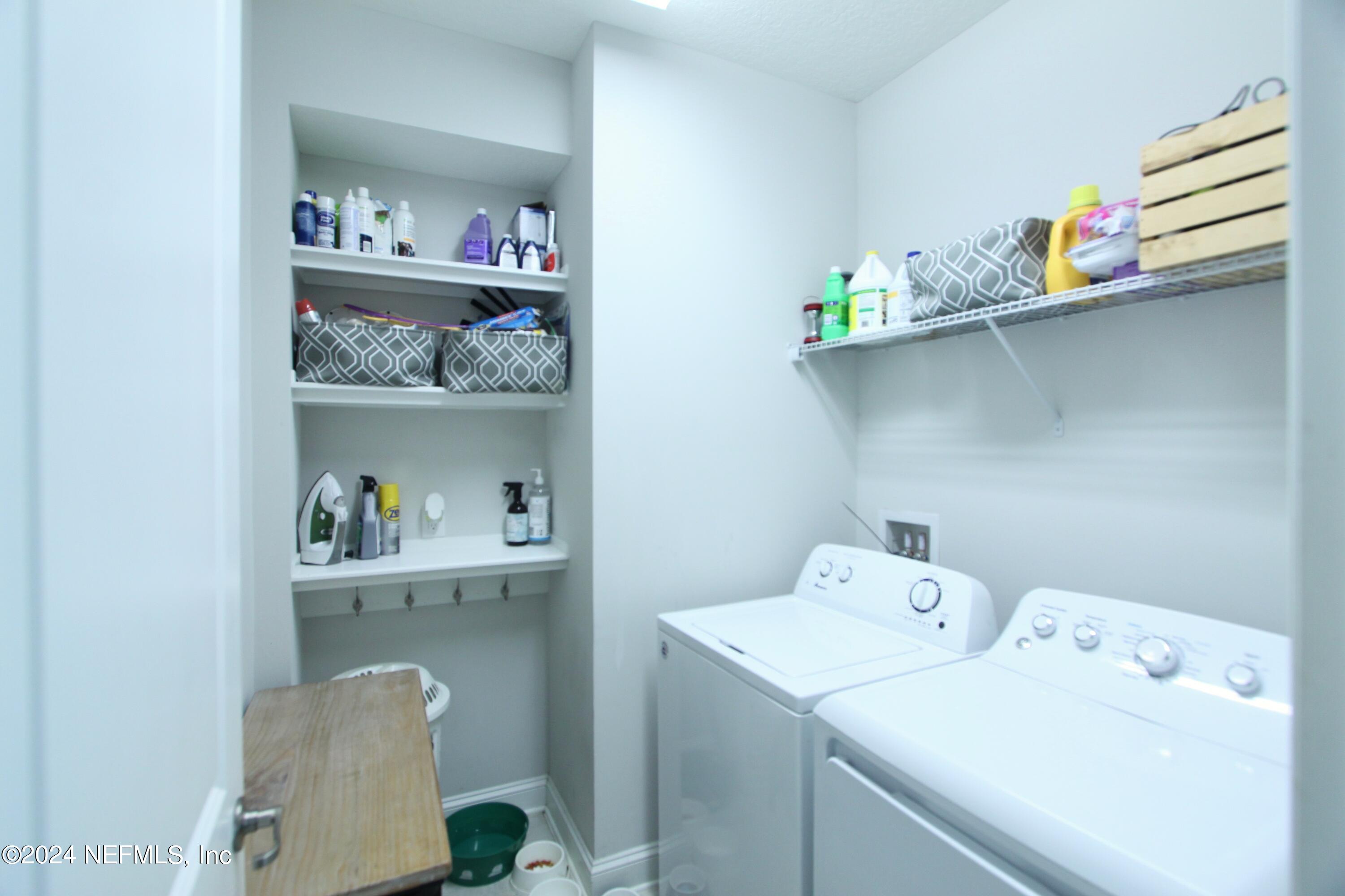 458 Convex Lane St. Augustine, FL 32095 - Photo 21 of 26 a utility room with dryer and washer