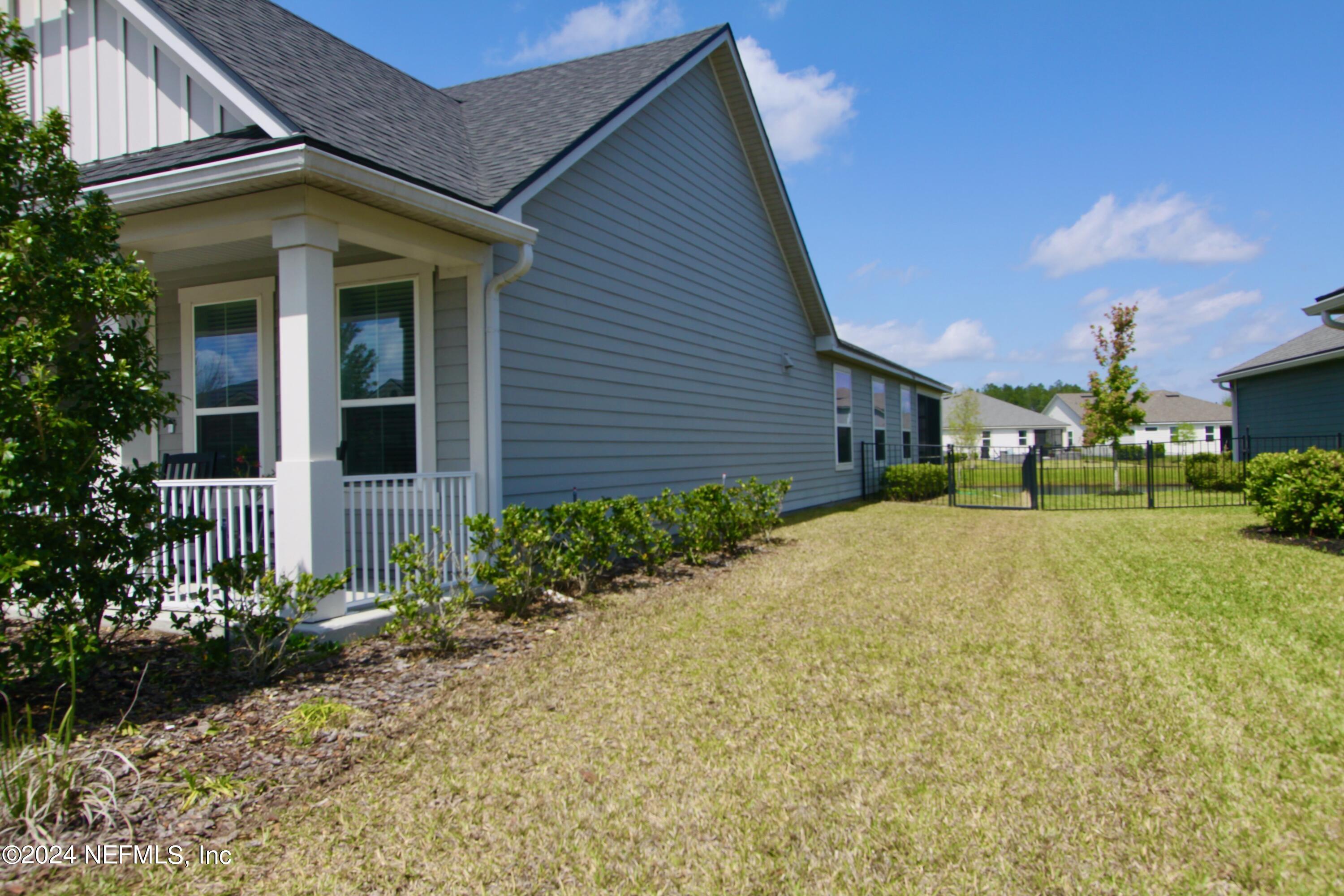 458 Convex Lane St. Augustine, FL 32095 - Photo 24 of 26 a view of a yard in front of house