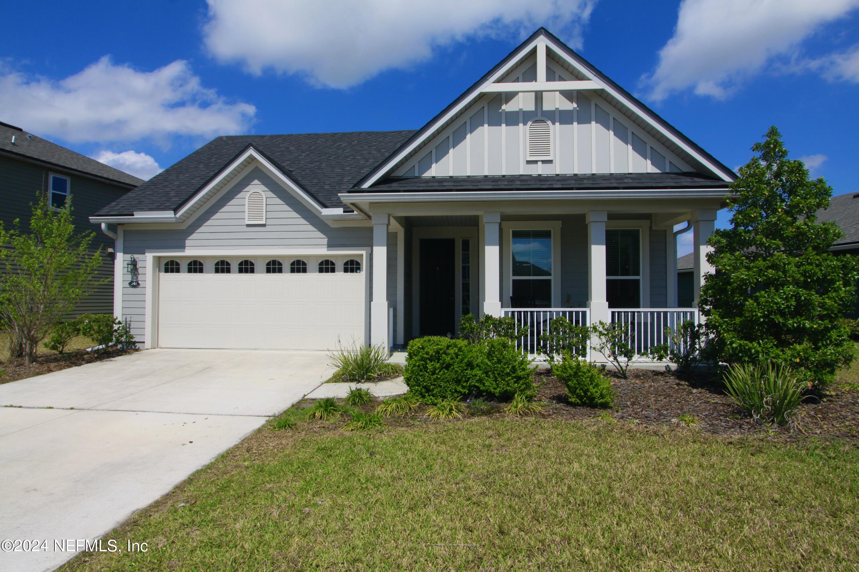 458 Convex Lane St. Augustine, FL 32095 - Photo 26 of 26 a front view of a house with garden