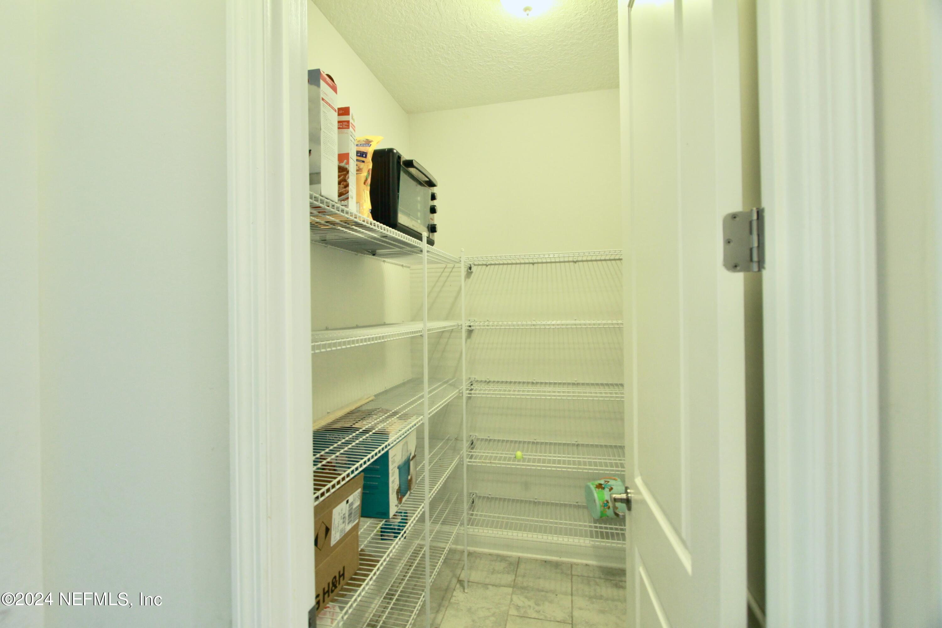 458 Convex Lane St. Augustine, FL 32095 - Photo 9 of 26 a bathroom with a shower