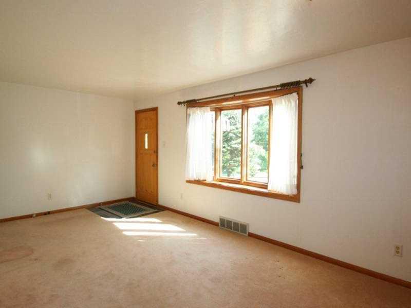 3079 East Hardies Road Gibsonia, PA 15044 - Photo 8 of 24 Living Room. Spacious and light and bright. Hardwood under carpet.