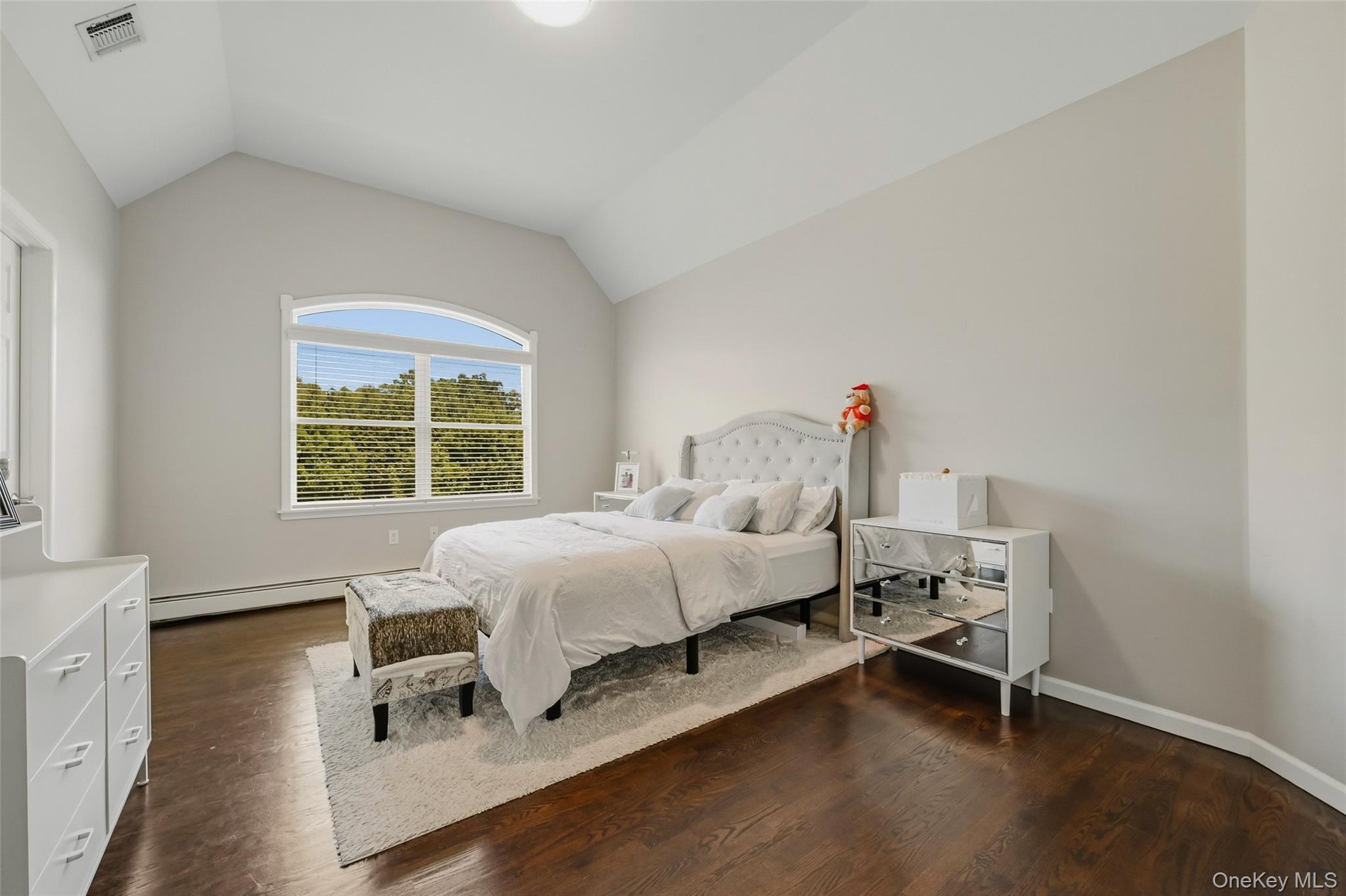 51 Meriwether Trail Congers, NY 10920 - Photo 27 of 50 Vaulted ceiling with an arched window