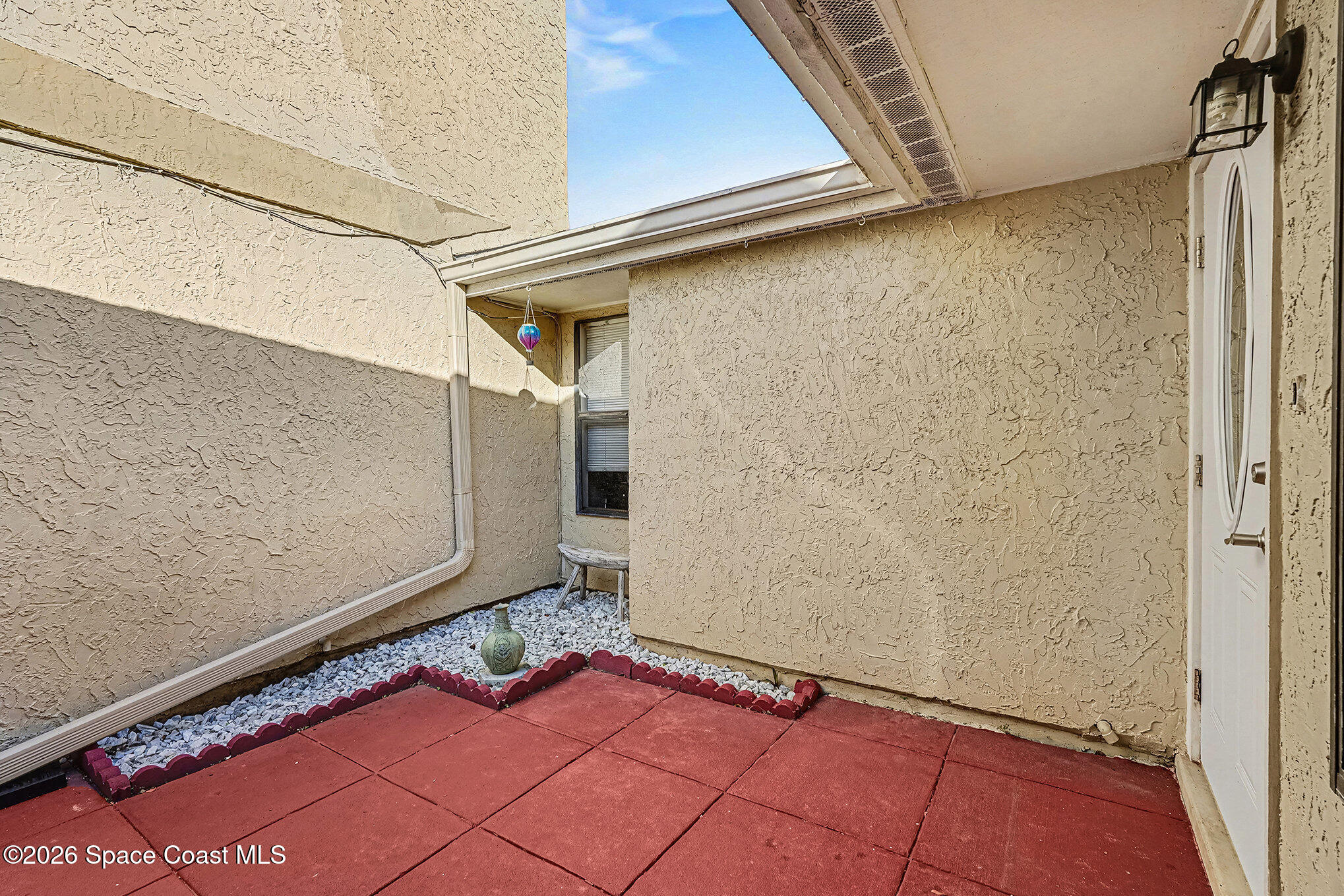1491 Sheafe Avenue Northeast, Unit 104 Palm Bay, FL 32905 - Photo 14 of 19 a view of an empty room
