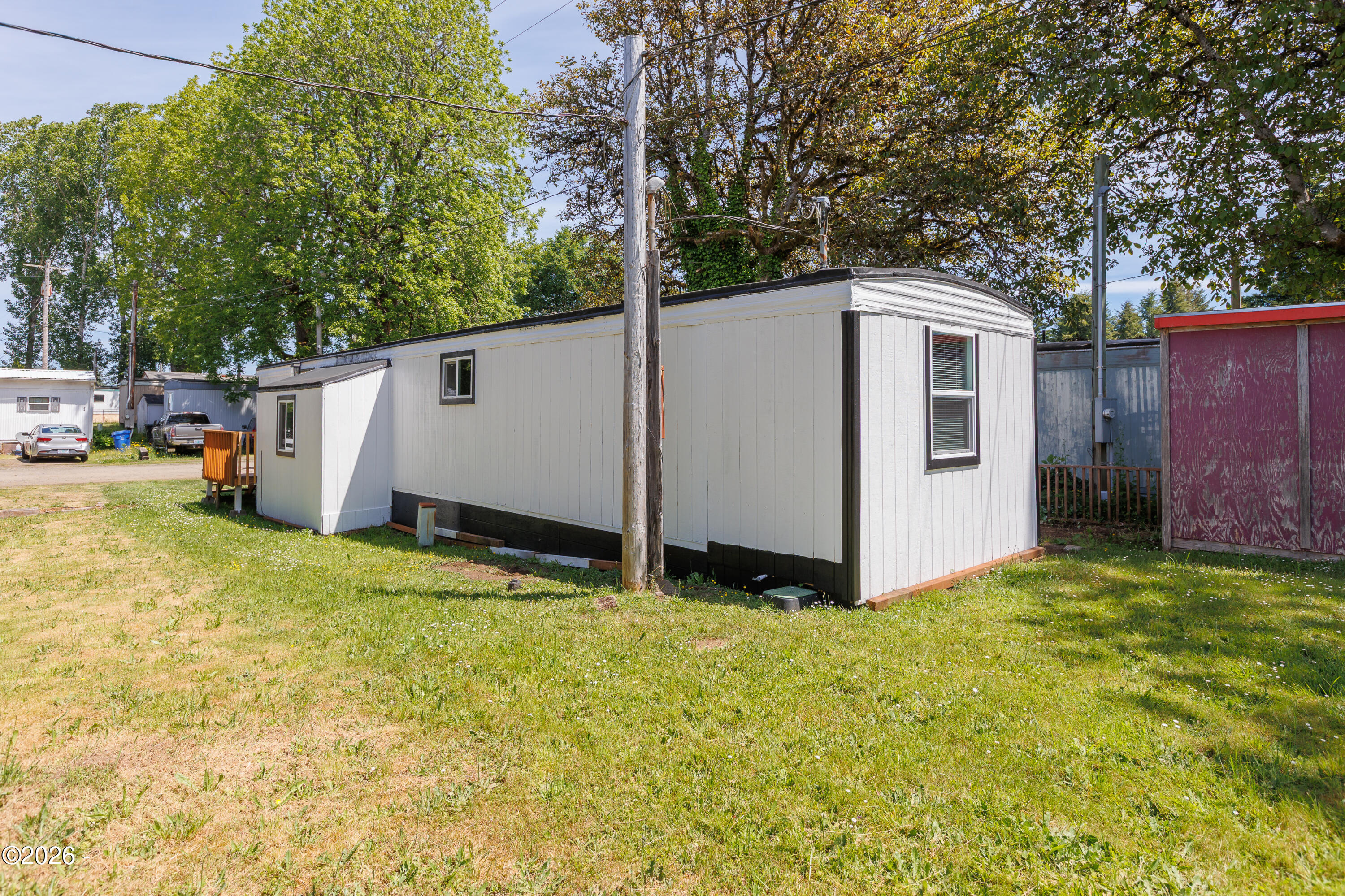 724 Southwest Ferry Avenue Siletz, OR 97380 - Photo 3 of 23 West Side