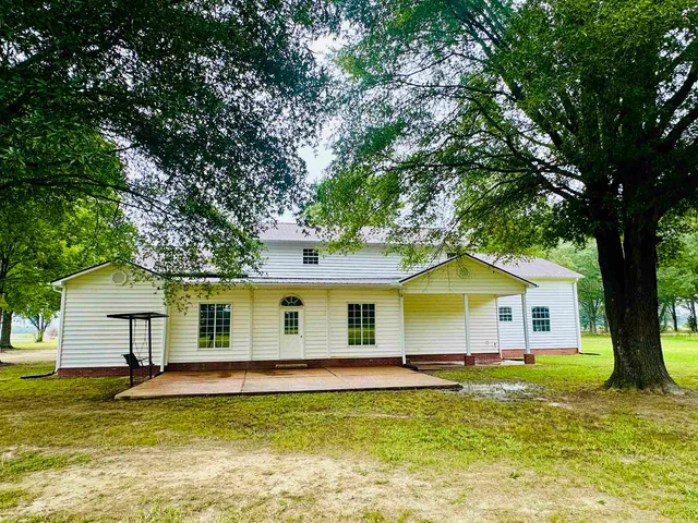 a view of a house with a swimming pool