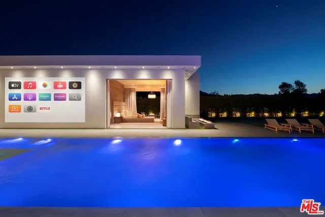 a view of swimming pool from a balcony
