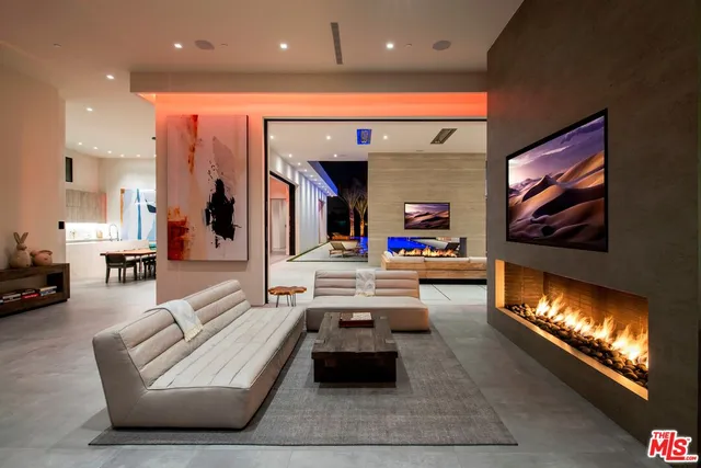 a view of a house with pool table and chairs