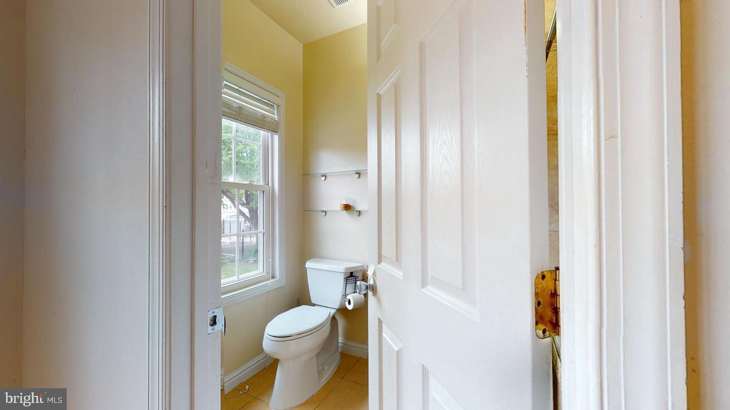 615 16th Street Northeast Washington, DC 20002 - Photo 20 of 33 a bathroom with a toilet and a shower