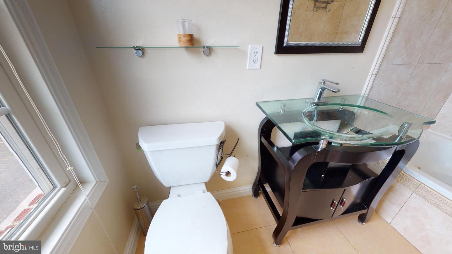 615 16th Street Northeast Washington, DC 20002 - Photo 22 of 33 a bathroom with a toilet and a sink