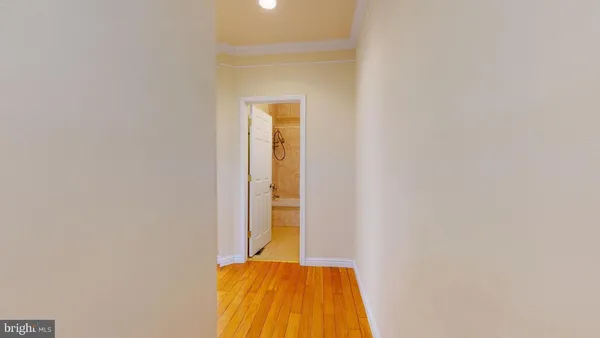 a bathroom with a sink a mirror and a shower