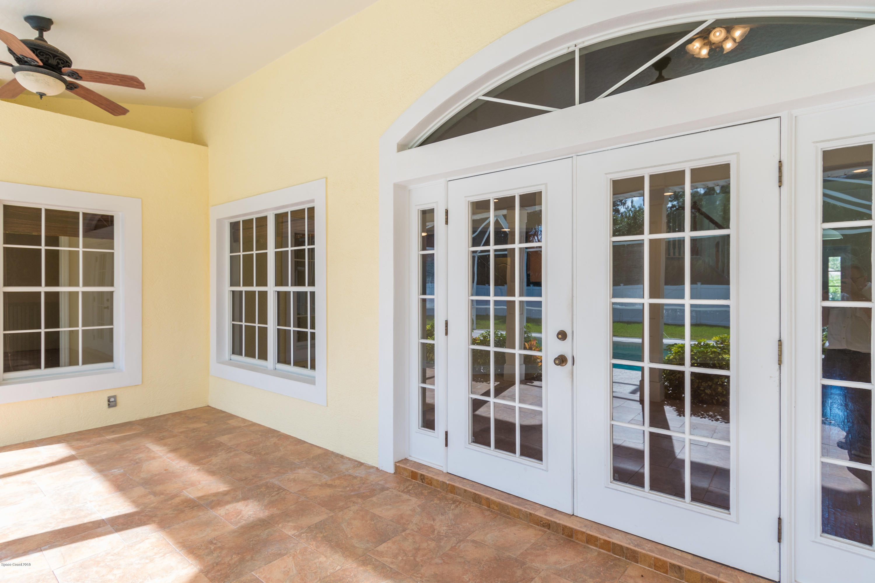 3420 Shady Run Road Melbourne, FL 32934 - Photo 19 of 33 a view of an empty room with windows