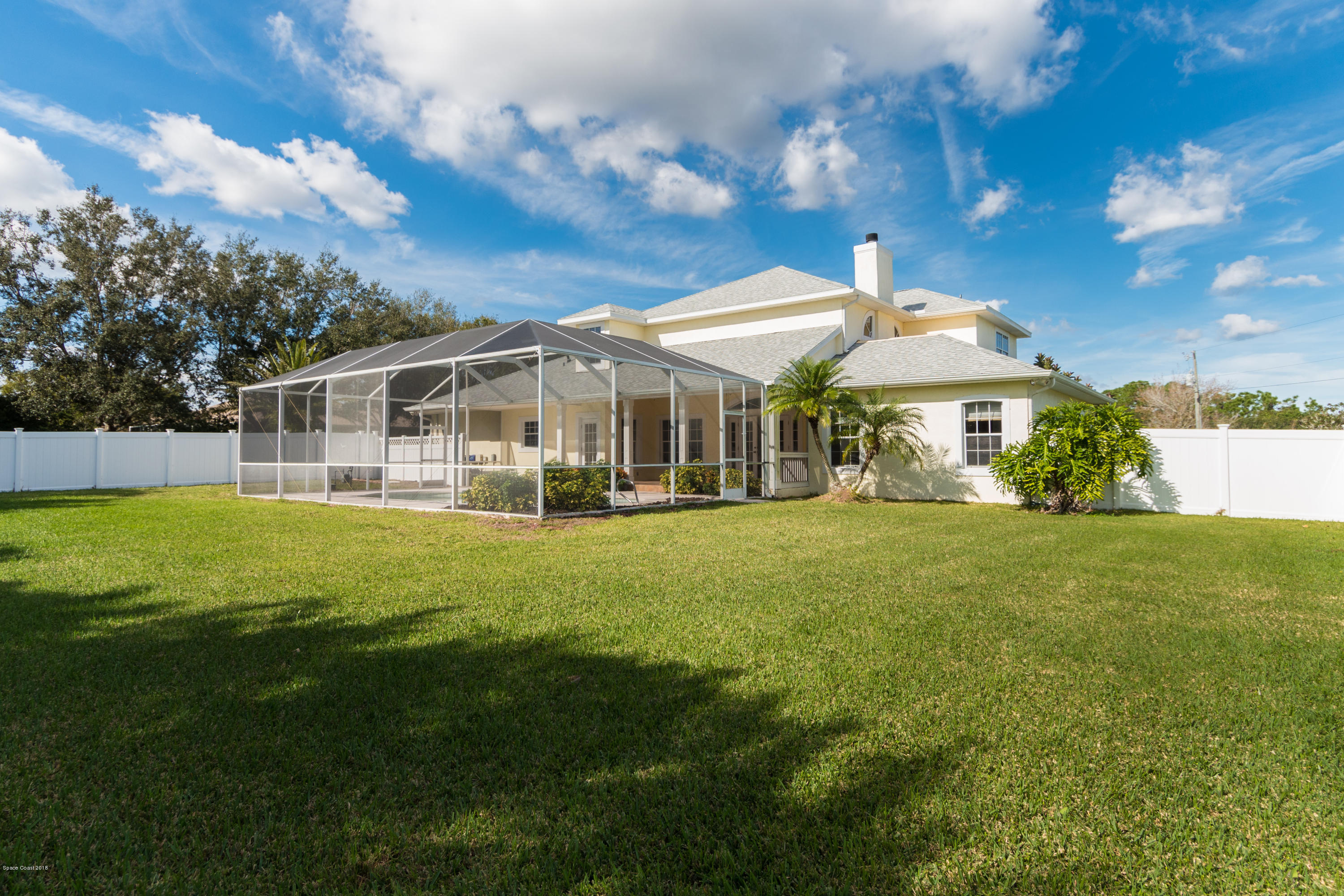 3420 Shady Run Road Melbourne, FL 32934 - Photo 20 of 33 a view of a house with a backyard