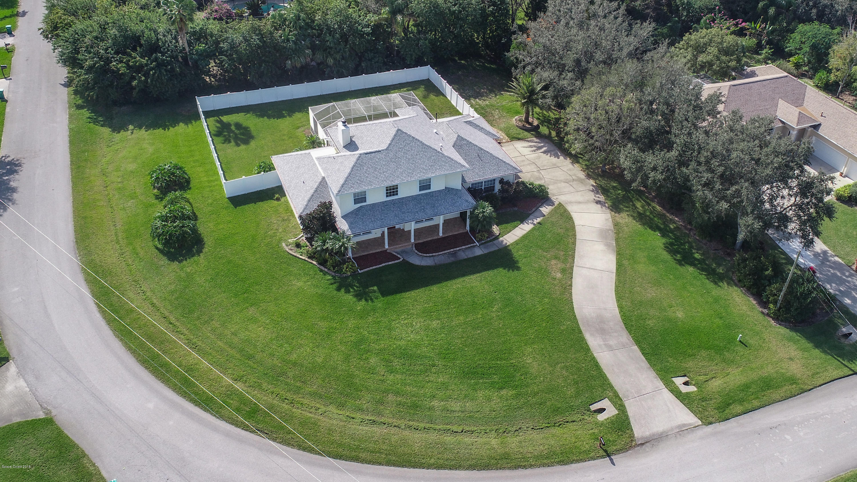 3420 Shady Run Road Melbourne, FL 32934 - Photo 24 of 33 an aerial view of a house with a garden