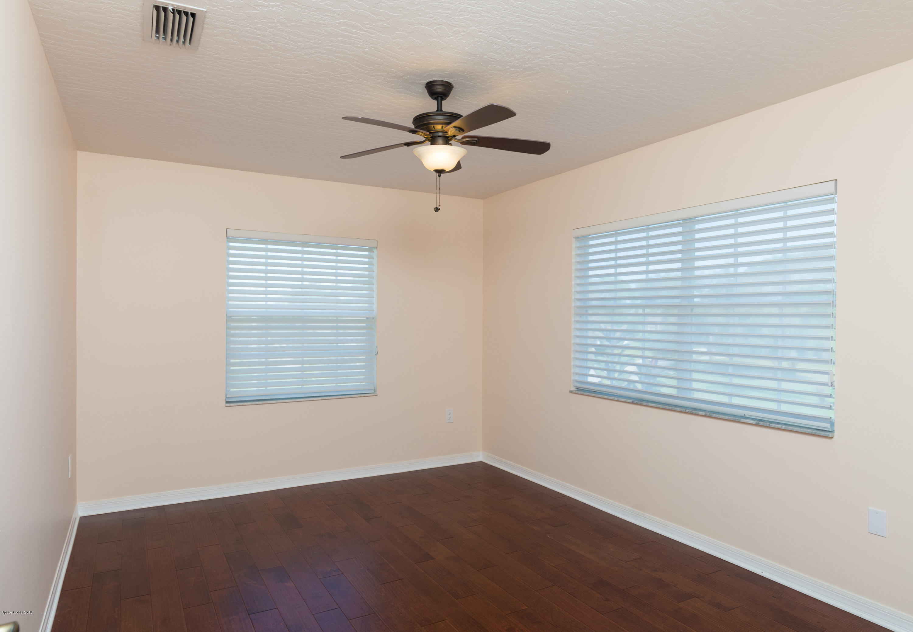3420 Shady Run Road Melbourne, FL 32934 - Photo 30 of 33 a view of an empty room with a window