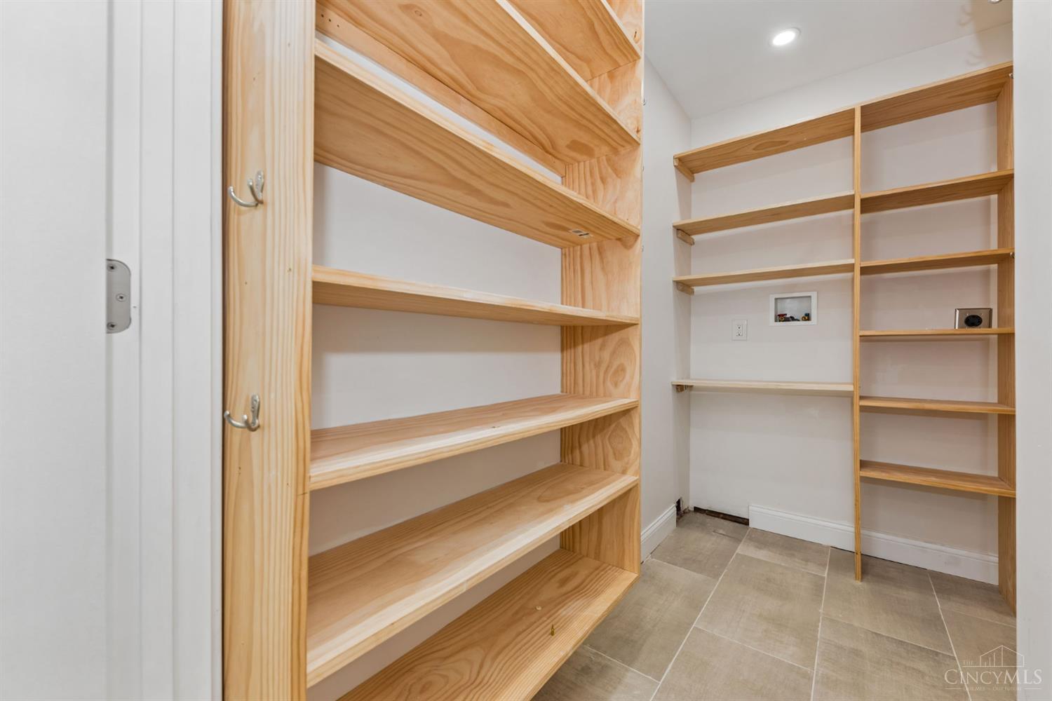 2183 8 Mile Road Cincinnati, OH 45244 - Photo 30 of 54 Walk in Closet in Primary with built-ins and laundry hook-ups.
