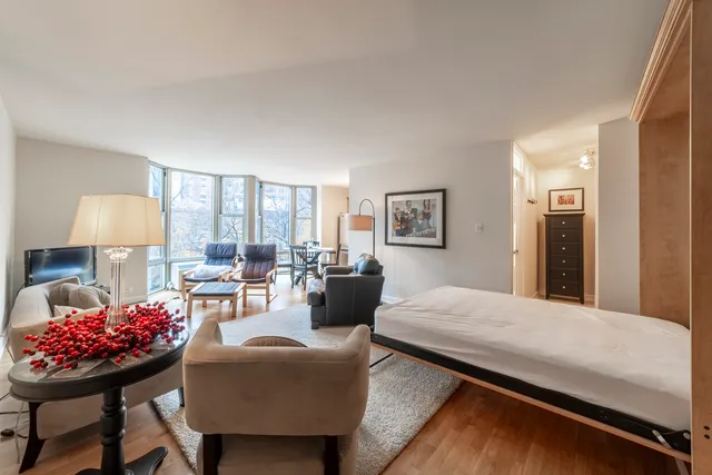 a living room with furniture and a table