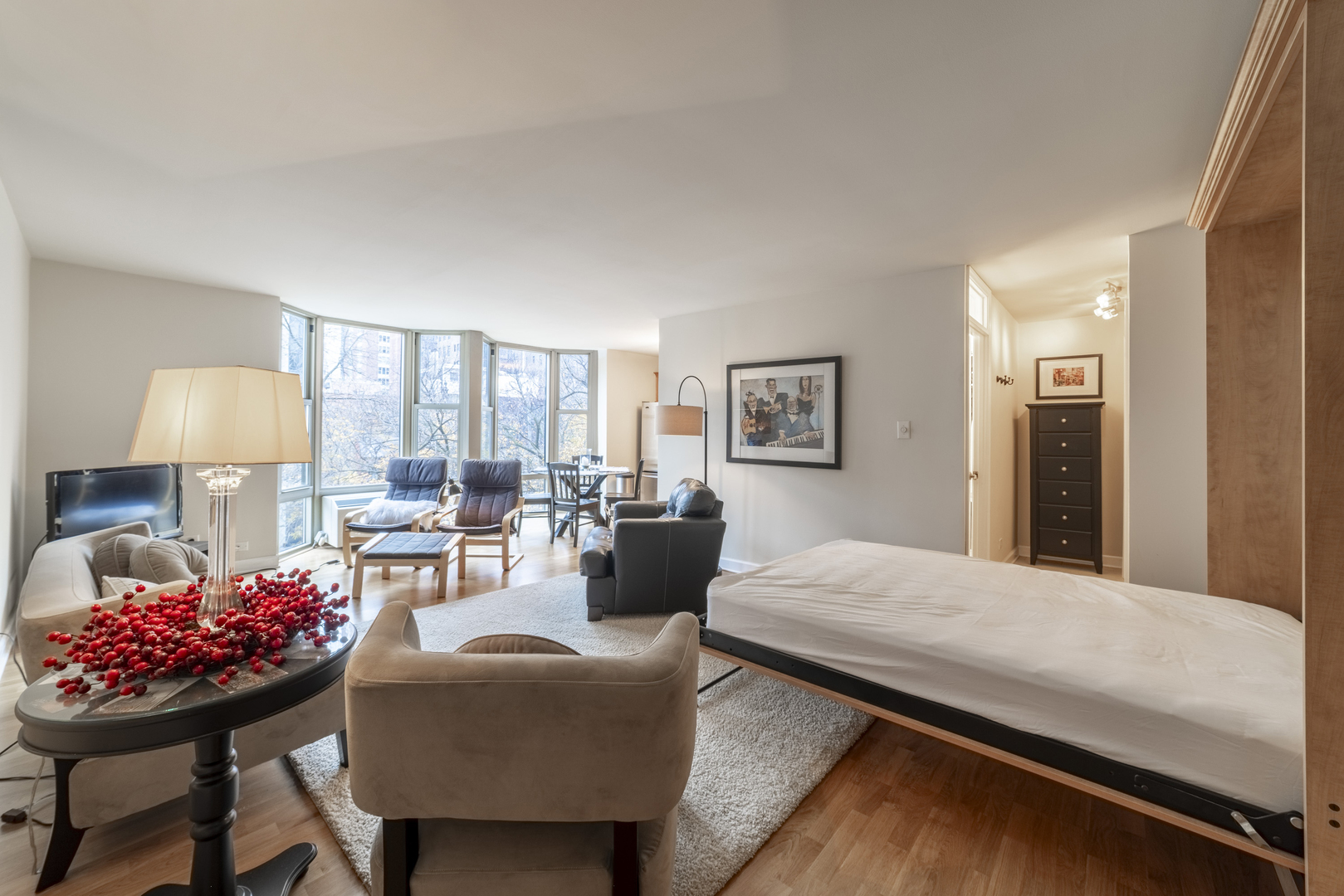 1340 North Dearborn Street, Unit 5C Chicago, IL 60610 - Photo 22 of 44 a living room with furniture and a table