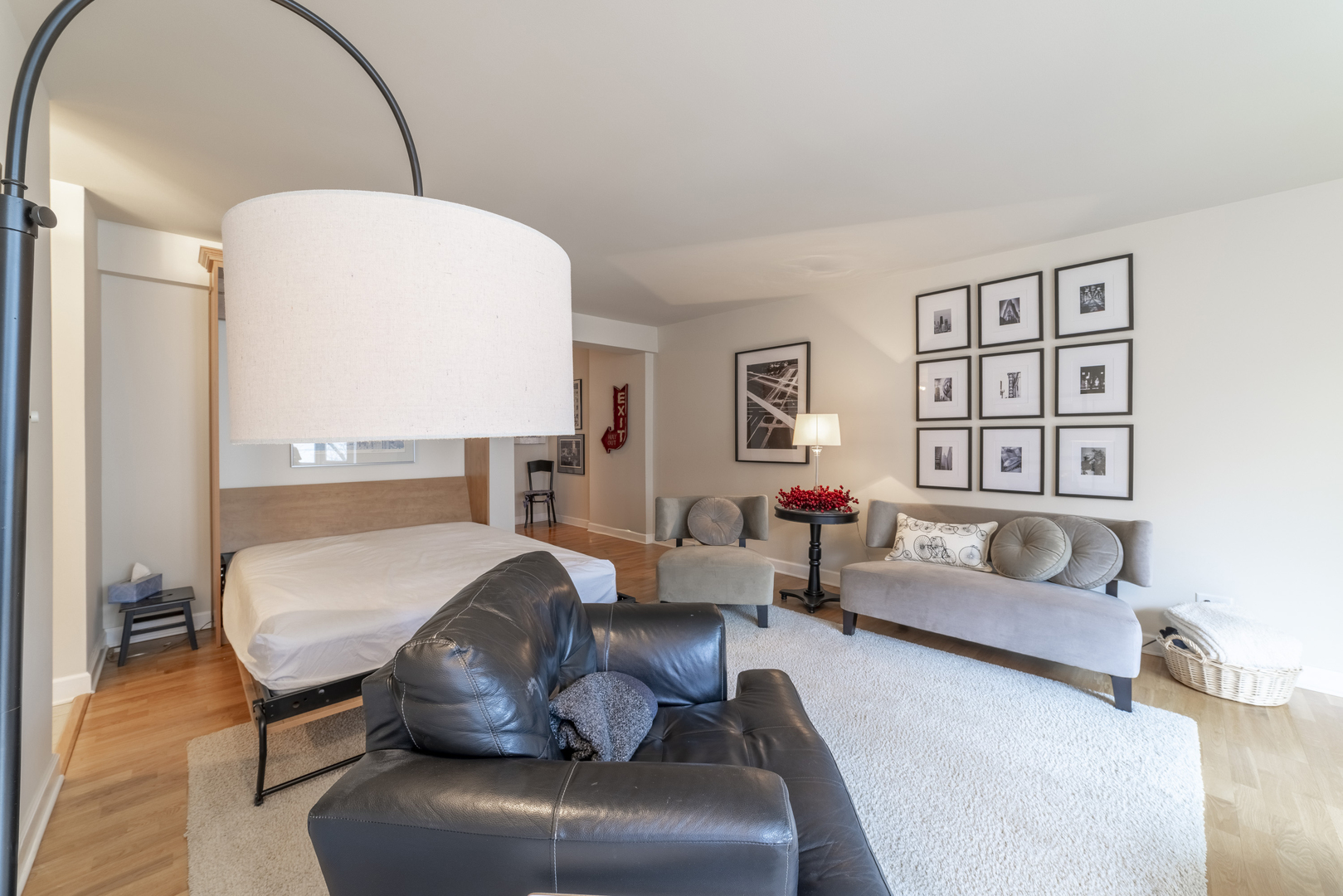 1340 North Dearborn Street, Unit 5C Chicago, IL 60610 - Photo 24 of 44 a living room with furniture and a large window